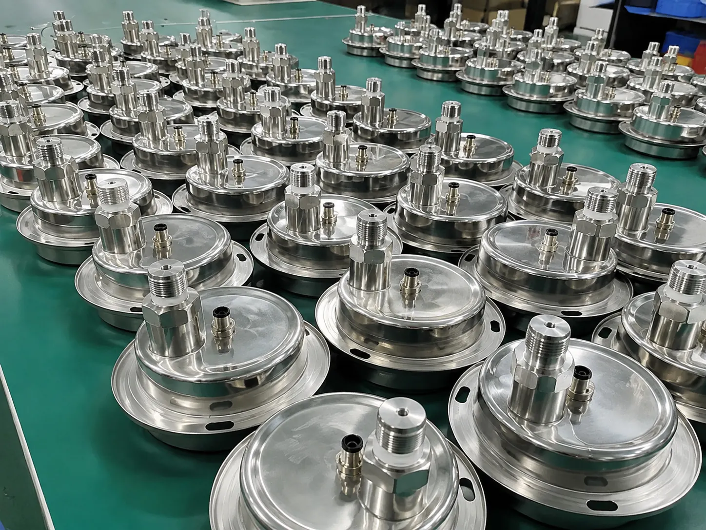 Finished stainless steel transmitter assemblies prepared for final inspection